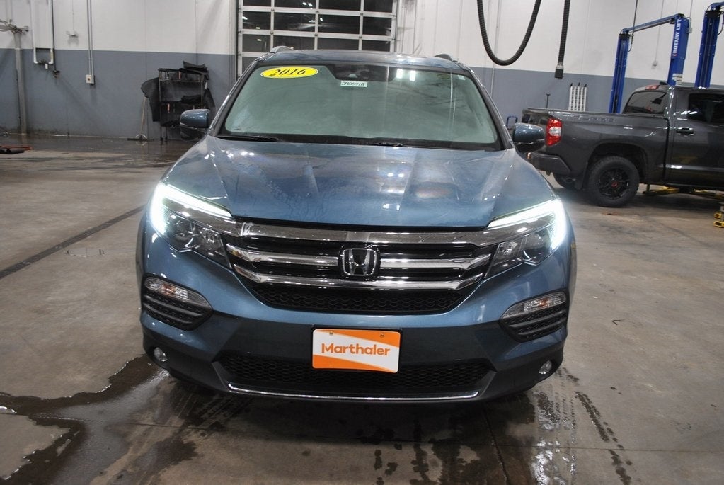 Used 2016 Honda Pilot Touring with VIN 5FNYF6H94GB060236 for sale in Worthington, Minnesota