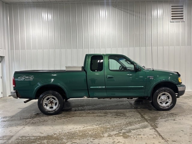 Used 1999 Ford F-150 XLT with VIN 1FTRX18L7XNB28112 for sale in Minneapolis, Minnesota